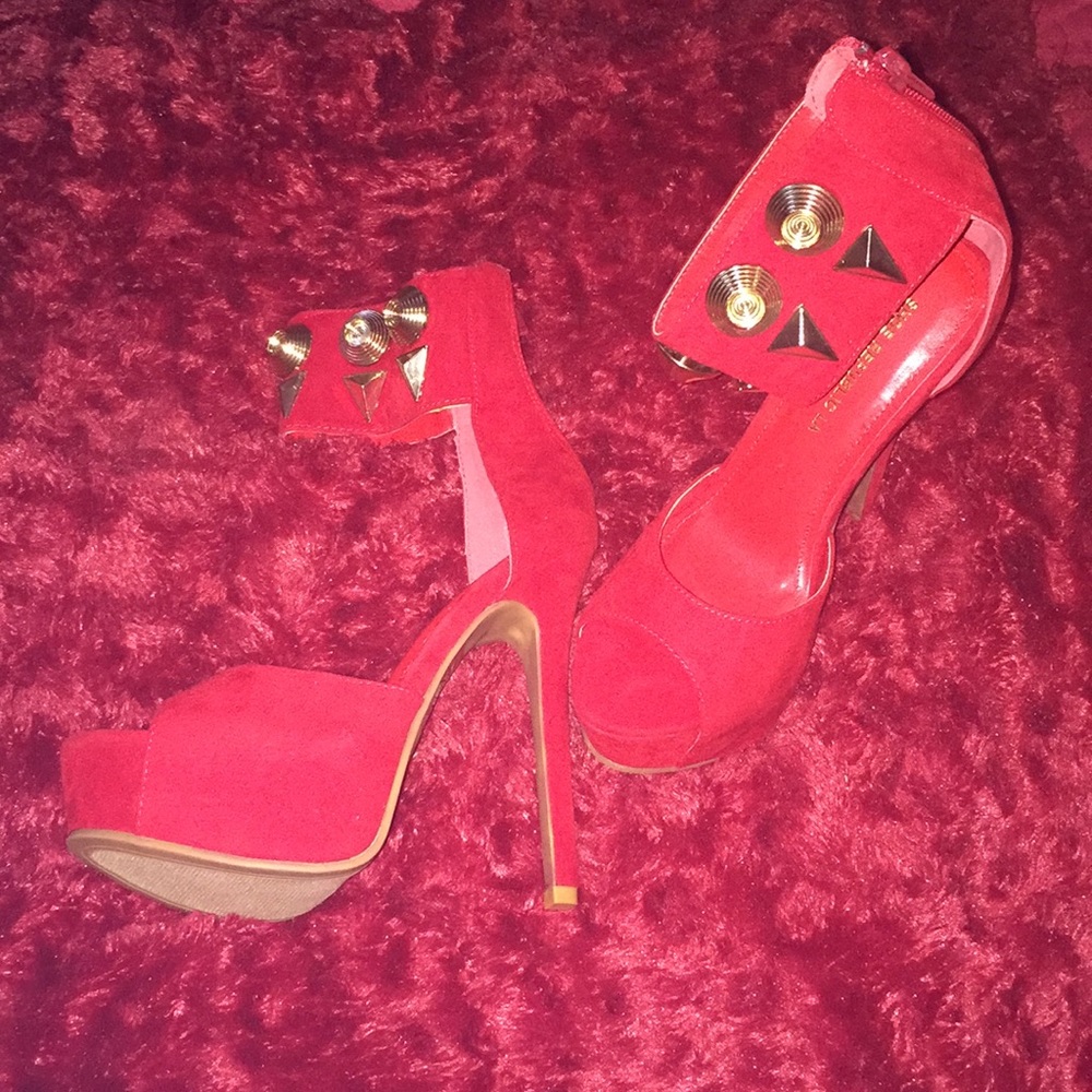 Brand new Red high heel peep toe shoes.